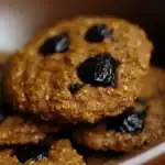 Rich chocolate chip oatmeal cookies with a chewy texture and dark chocolate chunks, perfect for snack or dessert. Made with wholesome oats and sweet chocolate for a delicious treat.