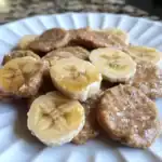 Creamy Banana Pancakes topped with honey from Waggy Chef, perfect for a delicious breakfast or snack. Fresh bananas and hearty pancakes create a flavorful, easy-to-make treat. Ideal for banana pancake lovers.