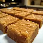 Buttery caramel oatmeal squares, delicious homemade dessert bars with a crunchy topping and chewy center, perfect for sweet snacking or sharing at gatherings, made by Waggy Chef.