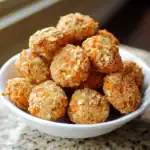 Falconetti Vetri di Gatto dry cat treats made with salmon, lentils, carrots, oats, and edible flowers, providing a healthy and delicious snack for cats.
