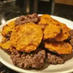 Roasted sweet potatoes with ground beef topping on a white plate, home-cooked comfort food, Waggy Chef.