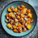 Crunchy roasted sweet potatoes with tender, seasoned chicken chunks, perfect for a healthy dog meal. Delicious, nutritious, and easy to prepare homemade dog food recipe.