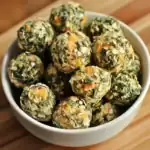 Fresh energy bites made with oats, spinach, carrots, and nuts, perfect for healthy snacks and energizing treats from Waggy Chef.