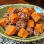 Savory beef and sweet potato meatballs in a green ceramic bowl, perfect for dog food or pet meals, highlighting nutritious ingredients, wholesome dog treats, and homemade pet food recipes.