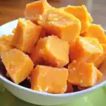 Sweet potato cubes in a white bowl for healthy pet treats or snacks - Waggy Chef.