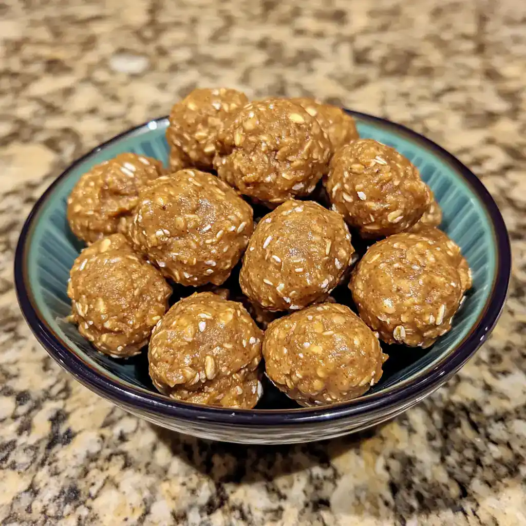 Soft oatmeal energy bites with peanut butter, honey, and oats, perfect for healthy snacks or quick energy boosts. Easy homemade recipe from Waggy Chef.