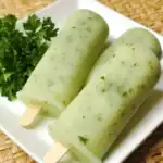 Refreshing homemade cucumber popsicles with fresh herbs, perfect for cooling down and healthy snacks. Made with ripe cucumbers and natural ingredients, ideal for summer treats and nutritious desserts.