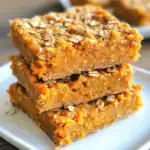 Sweet potato bars with oats and caramelized flavor, topped with oats and nuts, perfect for healthy snacks or dessert. Delicious, nutritious, easy-to-make baked treats.